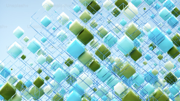 Cubi bianchi, azzurri e verde in una struttura regolare.